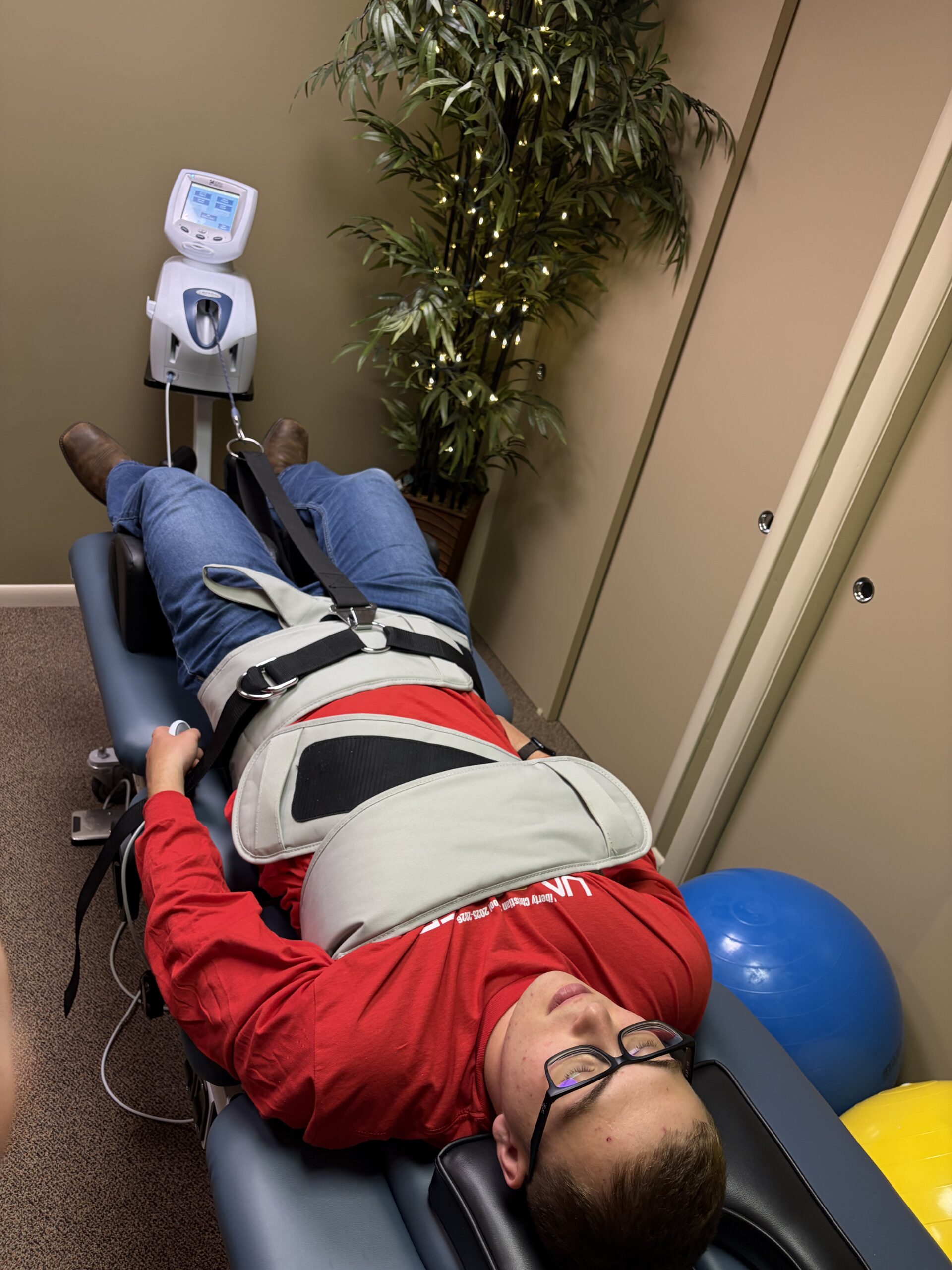 Dr. Shahnaz Sabeti providing spinal traction therapy