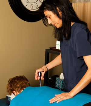 Chiropractic adjustment by Dr. Shahnaz Sabeti